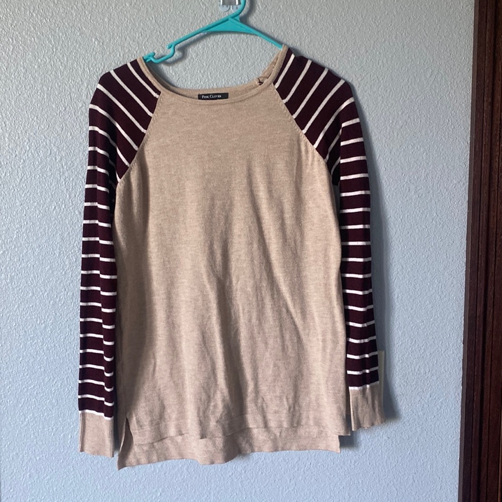 Pink clover size small tan with maroon and white sleeves. Elbow detail
